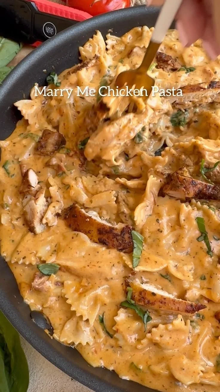 Delicious Marry Me Chicken Pasta served with fresh herbs and cheese