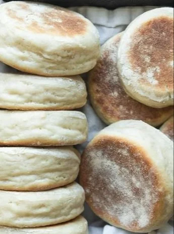Sourdough Discard English Muffins fresh out of the oven, golden and fluffy