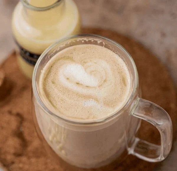 Delicious homemade white chocolate mocha sauce in a glass jar