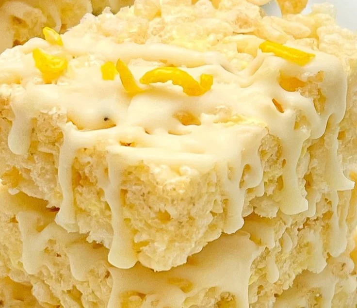 Lemon Rice Krispy Treats 3 Lemon rice krispy treats with a zesty twist, perfect for a sweet snack.